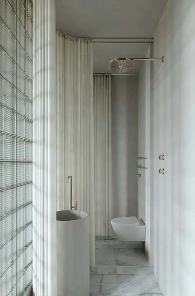 Minimalist White Bathroom Interior With Bamboo Partition Round Sink Brass Faucet And Toilet 3d model