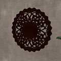 Dark Brown Wooden Circular Wall Hanging With Carved Lotus Patterns On Light Gray Wall