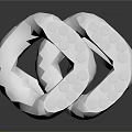 Silver Metallic Decorative Household Item With Intertwined Textured Structure And Shiny Finish
