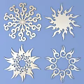 White Intricate Laser Cut Wall Decor Pieces With Sunburst And Floral Patterns On Blue Background