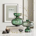 Decorative Ornament Set With Green Glass Vases Yellow Flowering Branches Books Candle And Gray Ornament