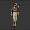 Woman Wearing Brown Shirt And Beige Pants With Brown Bag Waving Hand On Gray Background