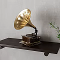 Golden Gramophone Instrument On Dark Wooden Shelf With Green Plant And Gray Wall
