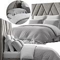 Modern Double Bed Setup With Tufted Headboard Gray Textured Bedding And Plush Pillows