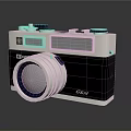 Vintage Digital Camera With GSTAR Brand Large Lens And Silver Black Body