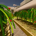 Well Designed Garden Landscape With Neatly Arranged Plant Beds Pathways And Greenery