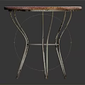 Round Furniture Table with Pink White Patterned Top and Ornate Metal Legs