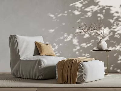 Gray Bean Bag Chair With Beige Cushion Brown Blanket Ottoman Side Table And Dried Branches 3d model
