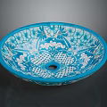 Artisan Carved Ceramic Basin with Blue White Floral Decorative Patterns