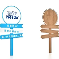 Directional Guide Signpost With Nestle Logo Blue Wooden Arrows And Informational Displays