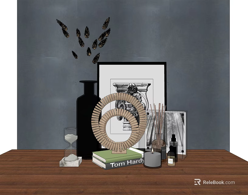 Decorative Ornament Set with Spiral Decor Hourglass Butterfly Wall Art and Book on Wooden Table 3d model 