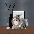 Decorative Ornament Set with Spiral Decor Hourglass Butterfly Wall Art and Book on Wooden Table