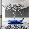 Modern Interior Sculpture With Silver Spheres Blue Boat Base And Black White Geometric Floor Design