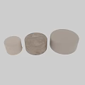 Beige Upholstered Round Ottomans In Various Sizes For Living Room Decor