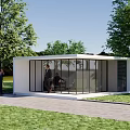 Modern Glass Entrance Gate Of Contemporary Building With Grass Trees And Car