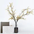 Yellow Flowering Branches Placed in Black Vase with Grey and White Square Pedestals