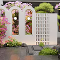 White Arched Scenic Garden Wall With Purple Flowers Green Plants And Stone Path