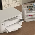 White HP Office Printer on Wooden Desk with Metal Organizer Calculator Folders and Sticky Notes