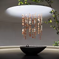 Modern Copper Chandelier With Hanging Decorative Pendants And Artistic Lighting Design