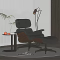Leather Lounge Chair With Ottoman Floor Lamp Side Table And Potted Plant On Wooden Floor