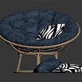 Blue Round Rattan Frame Chair With Tufted Cushion And Striped Pillows