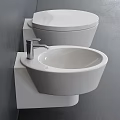 Modern Bathroom Interior Featuring Wall Mounted White Toilet And Bidet On Gray Wall