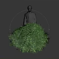 Green Plants Arranged in a Row with Standing Person Nearby