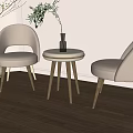 Minimalist Interior With Beige Chairs Round Side Table Green Plant Vase And Wooden Floor