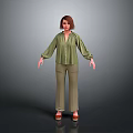Woman In Green Blouse And Green Pants With Short Brown Hair On Gray Background