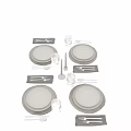 Modern Minimalist Dinnerware Set With White Plates Glass Cups Metal Cutlery And Napkins