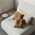 Modern Soft Brown And Beige Decorative Pillows On Light Sofa In Living Room