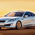 Silver Dynamic Sports Car Driving In Desert With Sunset Sky And Golden Wheels