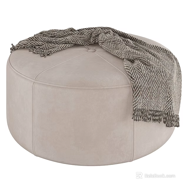 Soft Round Beige Upholstered Ottoman With Gray Herringbone Blanket Draped Over 3d model