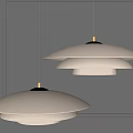 Modern White Layered Pendant Lights Hanging With Soft Lighting On Gray Wall