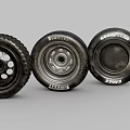 Car Tires from Different Brands with Various Wheel Designs Displayed in Studio
