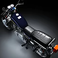 Classic Blue Motorcycle With Black Seat Chrome Details And Retro Design