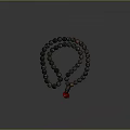 Round Black Beads Necklace With Red Flower Accent On Dark Background