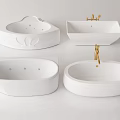 Modern White Bathtubs In Various Shapes Featuring Gold Faucets And Sleek Design