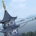 Traditional Chinese Multi tiered Tower With Black Roof Golden Spire By Lake Bridge And Hills
