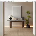Modern Console Table Entryway With Framed Artwork Table Lamp And Potted Plant On Light Walls