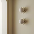 Elegant Modern Wall Sconces With Ornate Base And Round Bulb Mounted On Light Colored Wall 3d model