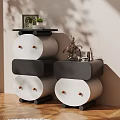Modern White and Black Chest of Drawers with Round Drawers Potted Plant and Photo Frame