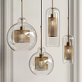 Modern Pendant Lights With Transparent Glass Shades And Brass Perforated Metal Details