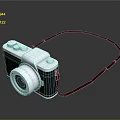 Classic Design Digital Camera With Silver Black Body And Red Strap On Black Background