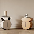 Elegant White and Beige Bedside Tables with Wheels Books Clock and Decorative Items