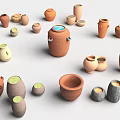 Green Plants Thriving in Various Colored Terracotta Clay Pots Arrangement