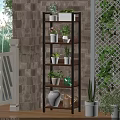 Outdoor Multi Tiered Plant Shelf With Potted Greenery And Decorative Vases