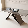 Sleek Modern Glass Top Dining Table With Geometric Metal Frame Tray And Books On Surface