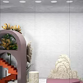 Modern Window Display Merchandising With Art Sculptures Display Tables Green Plants And Lighting Design