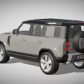 Grey Land Rover Defender SUV With Black Roof And UK License Plate